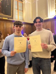 two students with cert
